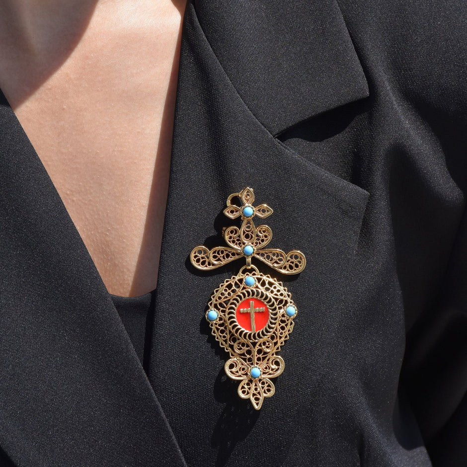 Broche traditionnel ostensoir