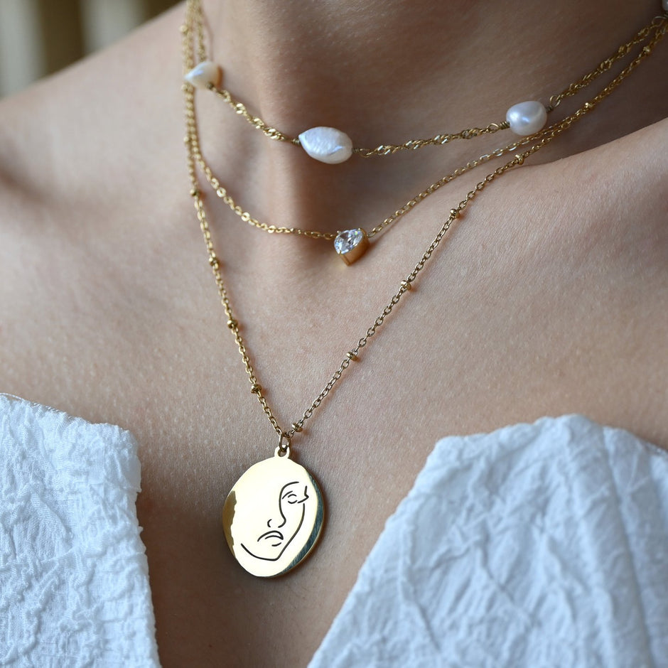 Collier lisse avec visage
