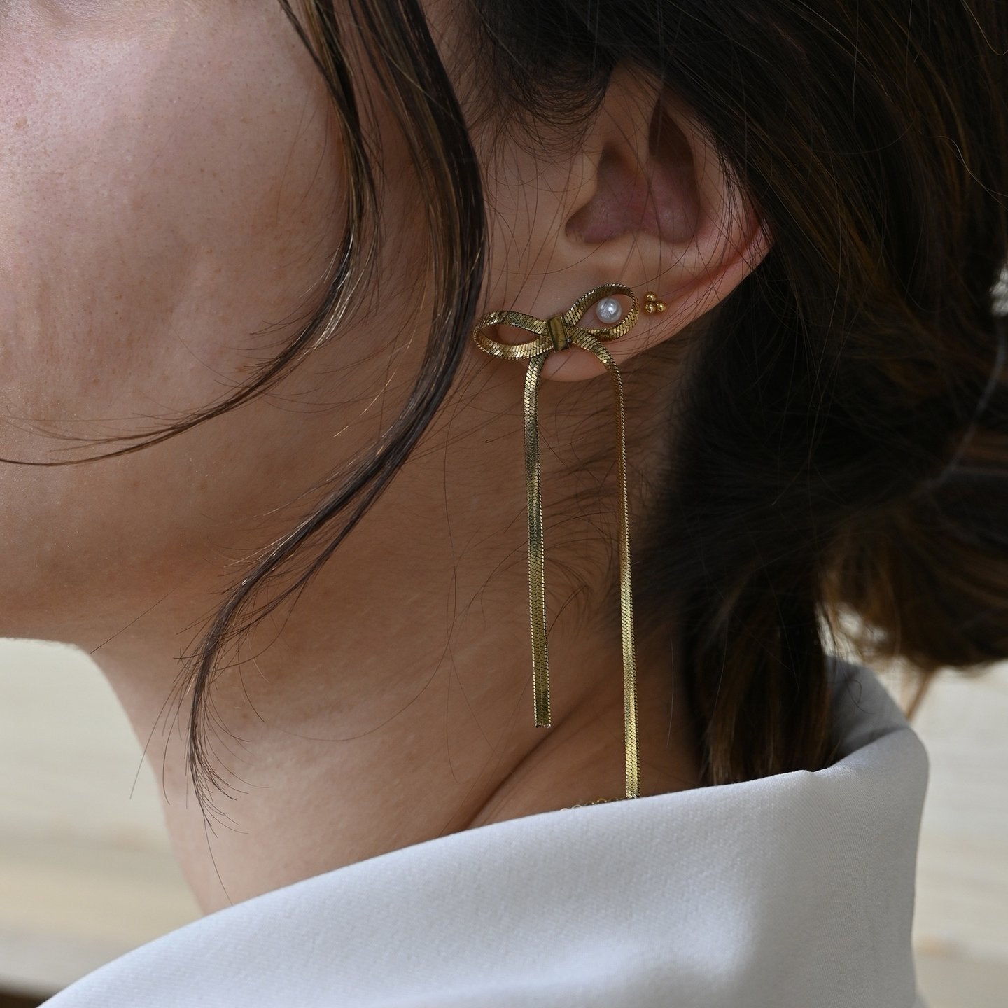 Boucles d'oreilles Alba en acier en forme de nœud