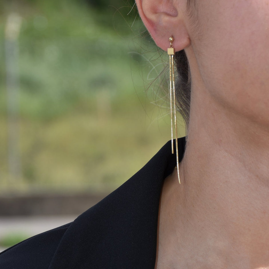 Boucles d'oreilles Alba en acier long simple