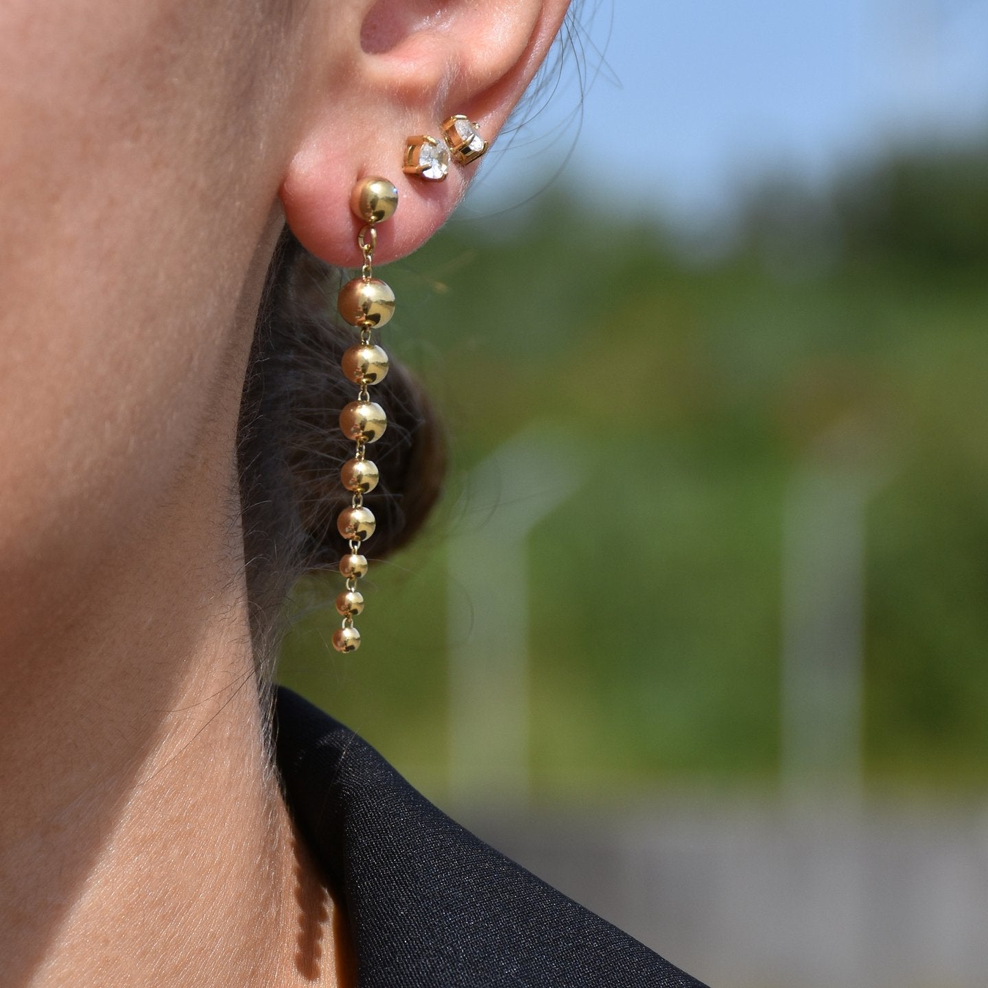 Boucles d'oreilles Alba en acier long boules