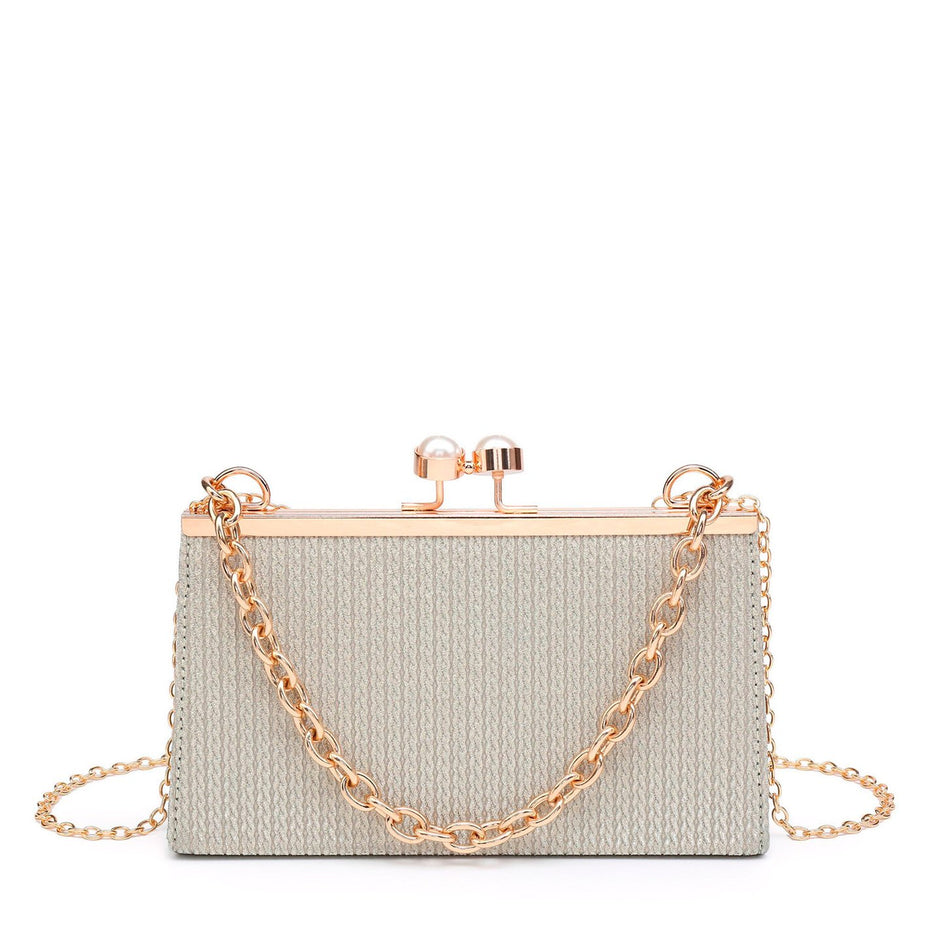 Sac de fête avec anse chaîne et perles sur le fermoir
