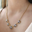 Collier plaqué or 5 fleurs ovale