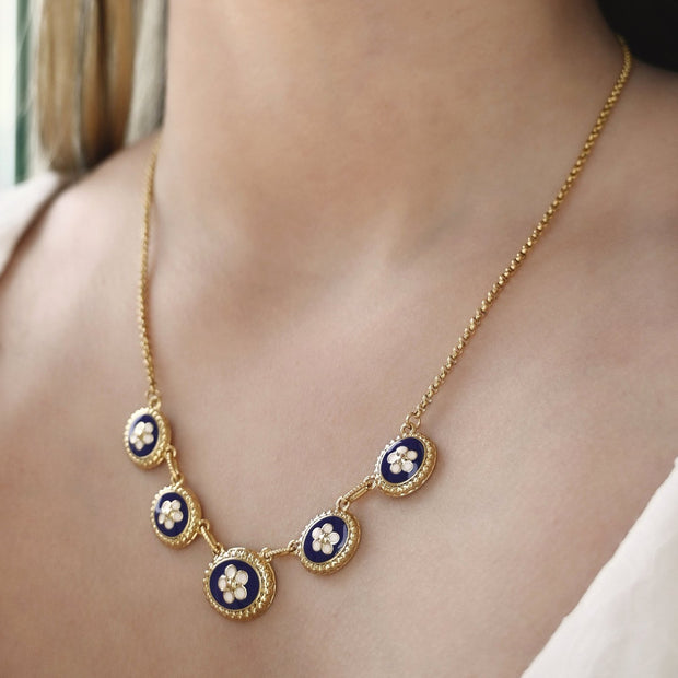 Collier plaqué or 5 fleurs ovale