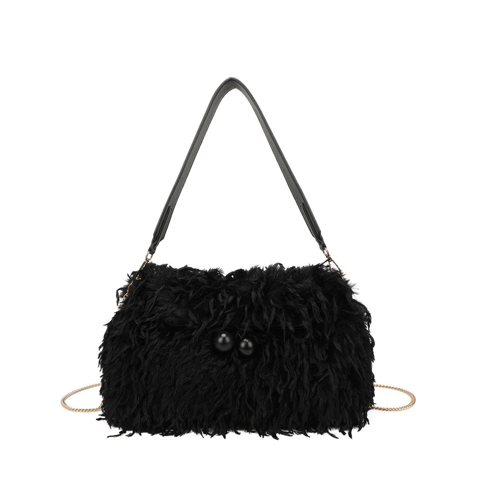 Sac à main avec poils et plumes