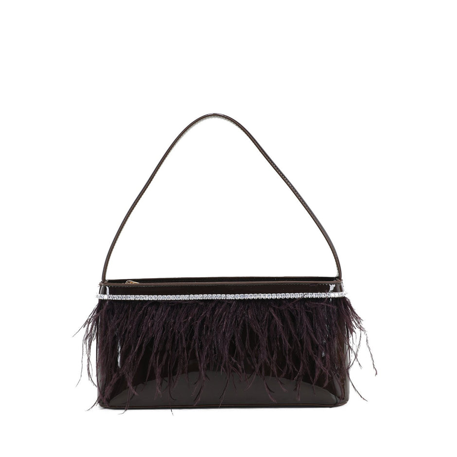 Sac à main en vernis et plumes