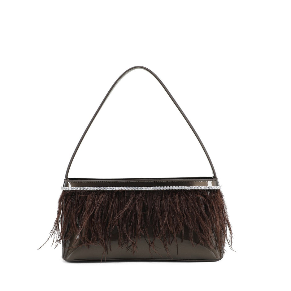 Sac à main en vernis et plumes