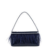 Sac à main en vernis et plumes
