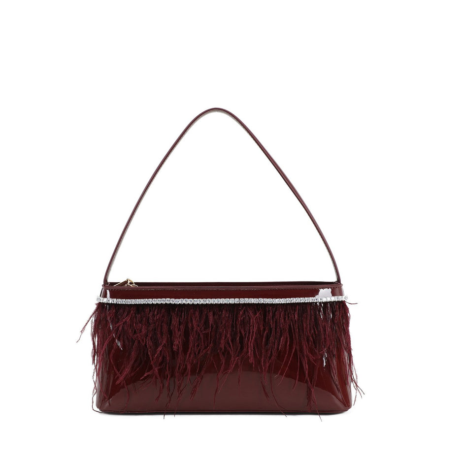 Sac à main en vernis et plumes