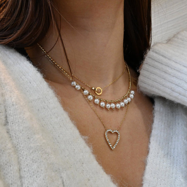 Collier en acier avec pendentifs en perles
