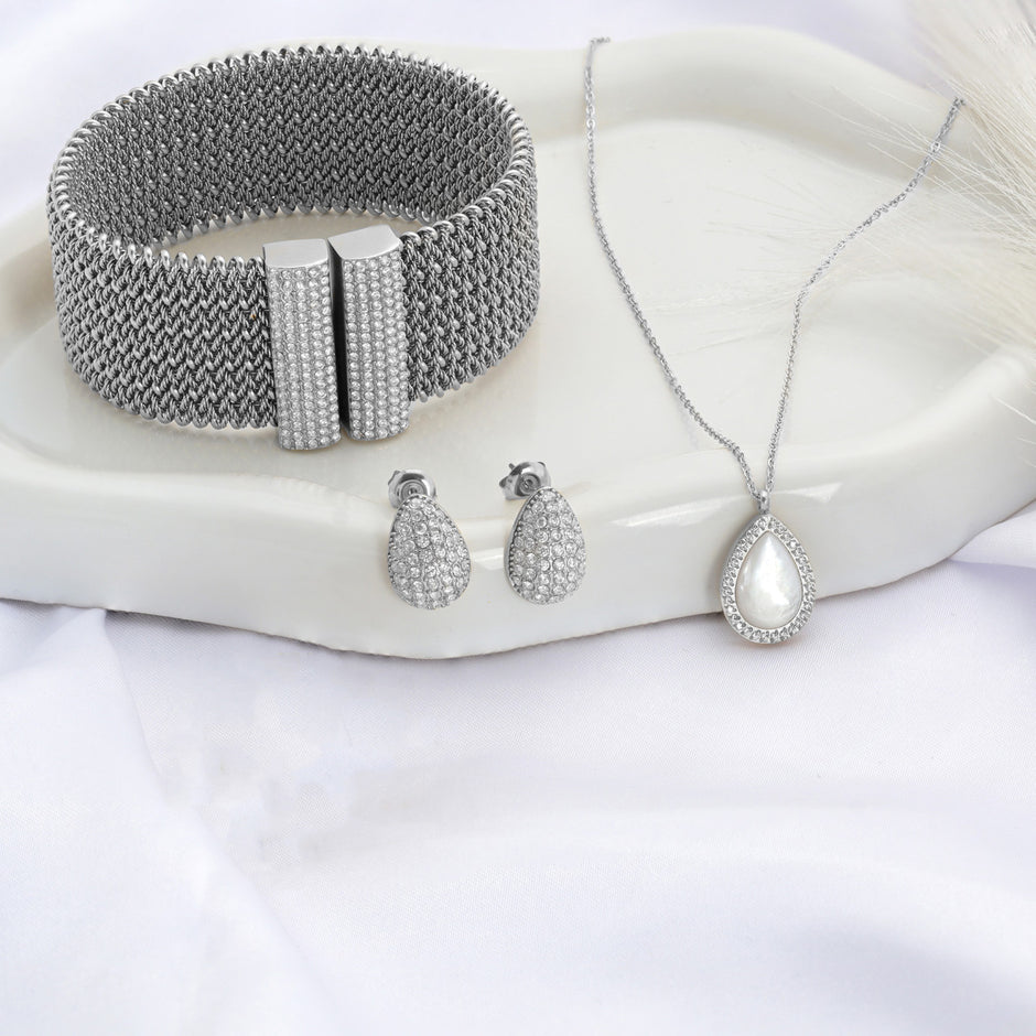 Ensemble Collier, Boucles d'oreilles et bracelet en acier nacre ovale