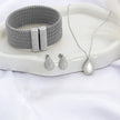 Ensemble Collier, Boucles d'oreilles et bracelet en acier nacre ovale